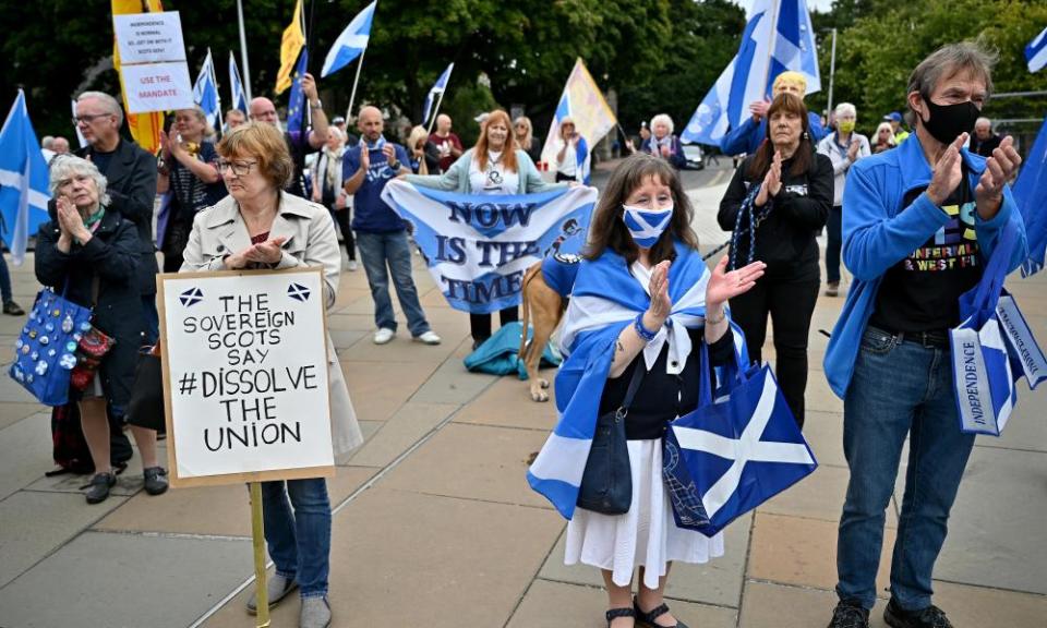 Members of the Yes movement demonstrate outside the Scottish parliament in August 2021.