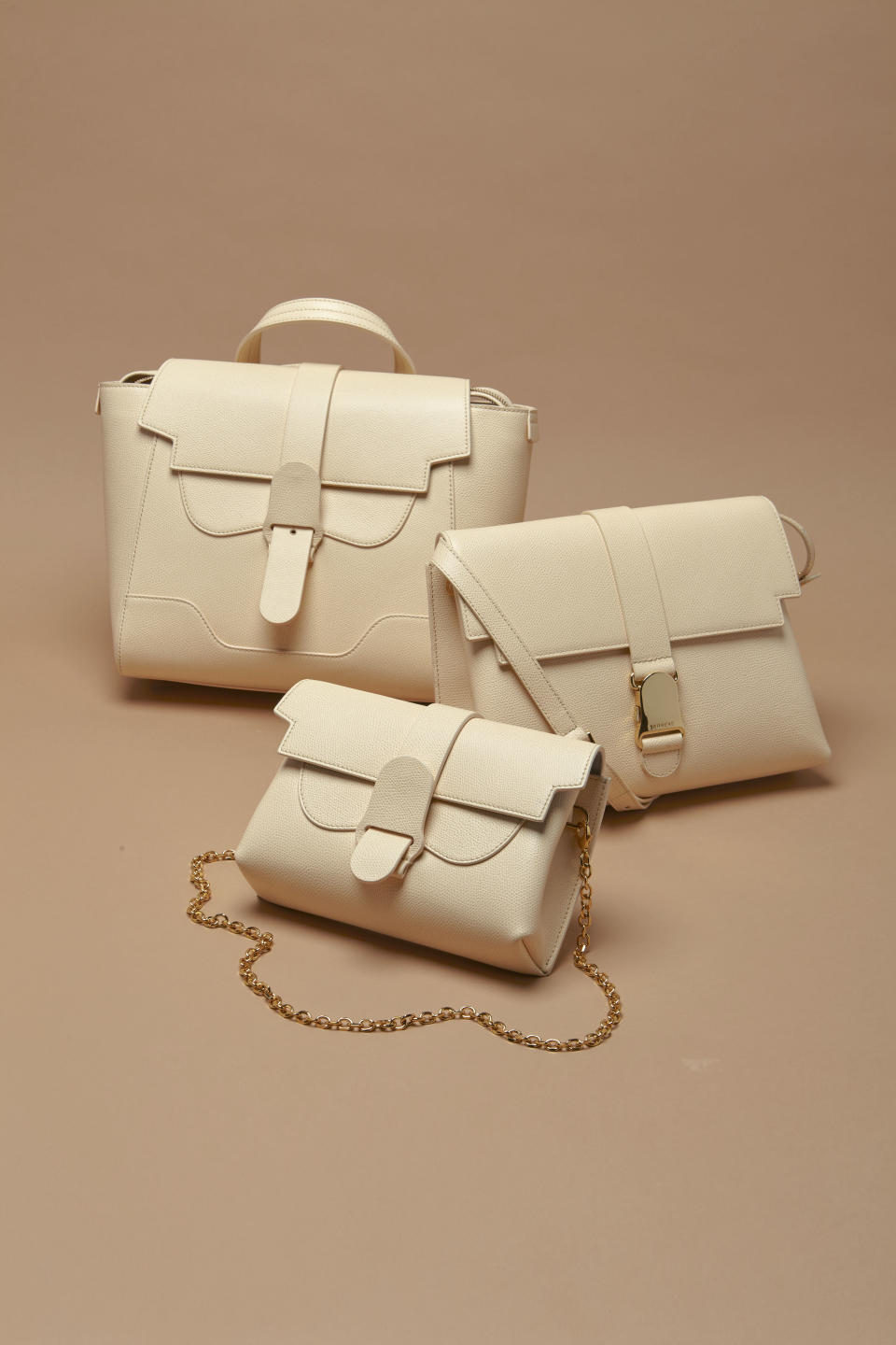 Senreve’s Aria, Midi Maestra, Cadence Shoulder bags in a Chablis colorway in collaboration with M.M. LaFleur.