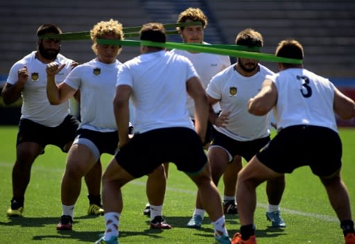 Players of Penarol's rugby team take part in a training session