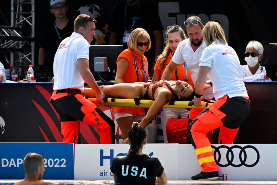 Anita Alvarez is carried on stretcher after passing out in the pool at the 19th FINA World Championships in Budapest, Hungary. Alvarez had previously passed out during an Olympic qualifier in 2021. (AP Photo/Anna Szilagyi)