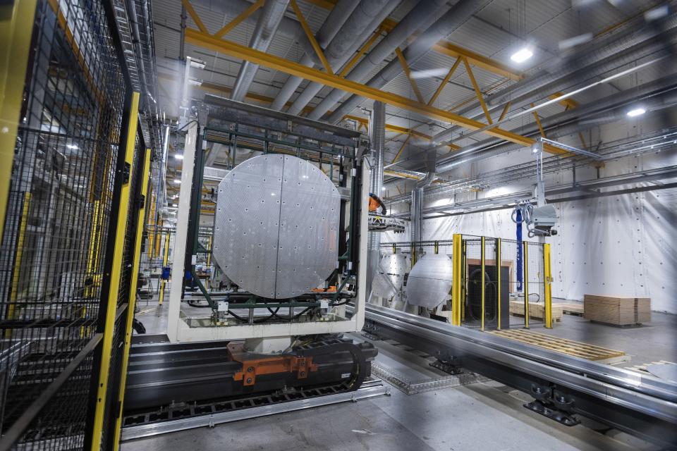 A machine is operated at a facility for the Norwegian company Nel in Heroya, Norway, on April 20, 2023. Nel makes devices that take water and split it into hydrogen and oxygen, known as electrolyzers, as well as fueling stations. The company announced plans Wednesday, May 3, to build a massive new plant in Michigan as it works with General Motors to drive down the cost of hydrogen. (AP Photo/Trond R. Teigen)