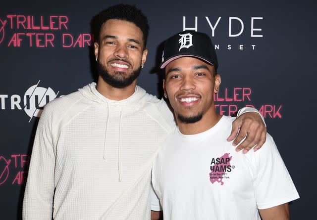 <p>Vivien Killilea/Getty</p> Equanimeous St. Brown and Amon-Ra St. Brown attend Triller After Dark on February 13, 2022 in Los Angeles, California.