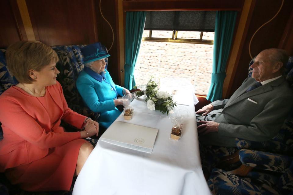 Queen, Prince Philip and Nicola Sturgeon on train
