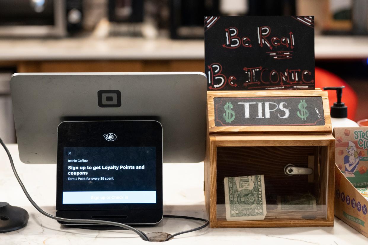 Dec 5, 2023; Hackensack, New Jersey, United States; A tip box on the counter at Iconic Coffee/