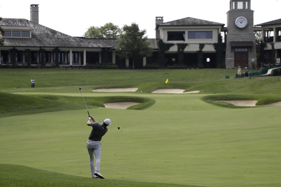 Jordan Spieth hits to the 18th green during the first round of the Memorial golf tournament, Thursday, July 16, 2020, in Dublin, Ohio. (AP Photo/Darron Cummings)