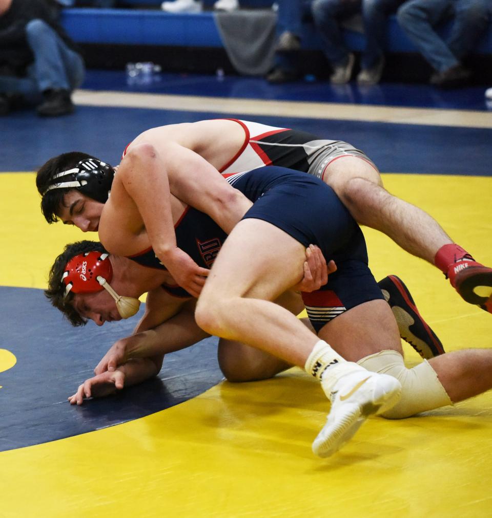 Gilbert's Fernando Villaescusa controls Ballard's Gabe Christensen in the championship round at 182 pounds during the Class 2A sectional wrestling meet at Humboldt Saturday. Villaescusa, ranked second, defeated Christensen, ranked third, by a 3-0 decision.