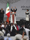 Mexican President Andres Manuel Lopez Obrador greets the crowd at a rally to commemorate his third anniversary in office, in the main square of the capital, the Zocalo, in Mexico City, Wednesday, Dec. 1, 2021. (Photo AP/Marco Ugarte)