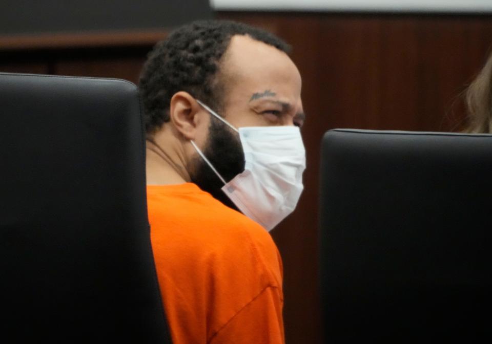 Darrell Brooks Jr. talks to defense attorney Anna Kees in the Waukesha County Courthouse courtroom on June 20.