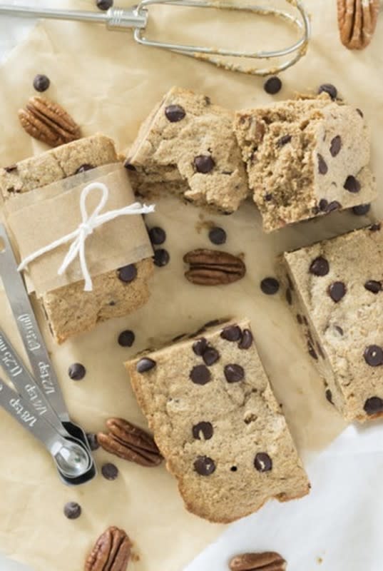 <p>Tasteaholics</p><p>Enjoy these Chocolate Chip Blondies that are a dense, gooey dessert scattered with chunks of chocolate plus crunchy pecan bits!</p><p><a href="https://www.tasteaholics.com/recipes/desserts/chocolate-chip-blondies/" rel="nofollow noopener" target="_blank" data-ylk="slk:Get the recipe!;elm:context_link;itc:0;sec:content-canvas" class="link ">Get the recipe!</a></p>