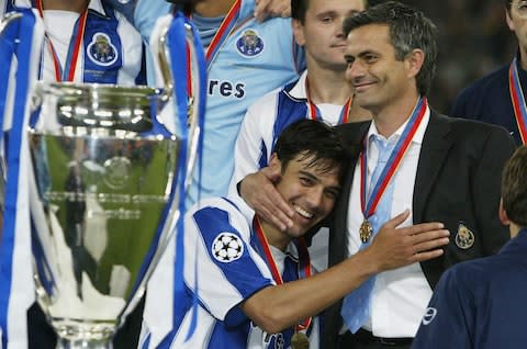 Nuno Valente of FC Porto hugs his manager Jose Dos Santos Mourinho after winning the Champions League during the UEFA Champions League Final match between AS Monaco and FC Porto at the AufSchake Arena on May 26, 2004 - Credit: Alex Livesey/Getty Images