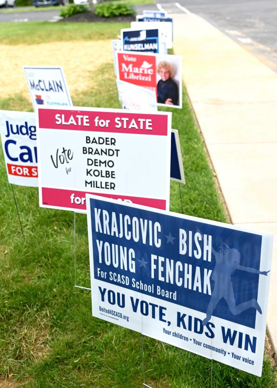 Campaign signs line the sidewalk outside of the Patton South 3 precinct for the primary election on Tuesday, May 16, 2023. Abby Drey/adrey@centredaily.com