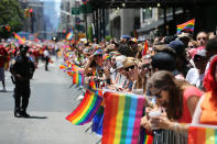 <p>People wave rainbow flags during the N.Y.C. Pride Parade in New York on June 25, 2017. (Photo: Gordon Donovan/Yahoo News) </p>