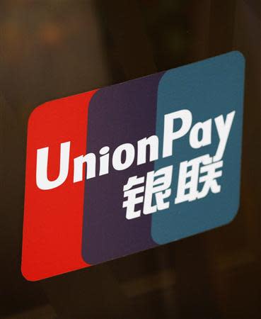 A UnionPay signage is pictured at its platinum VIP lounge at a mall in Singapore, in this picture taken January 23, 2014. REUTERS/Edgar Su