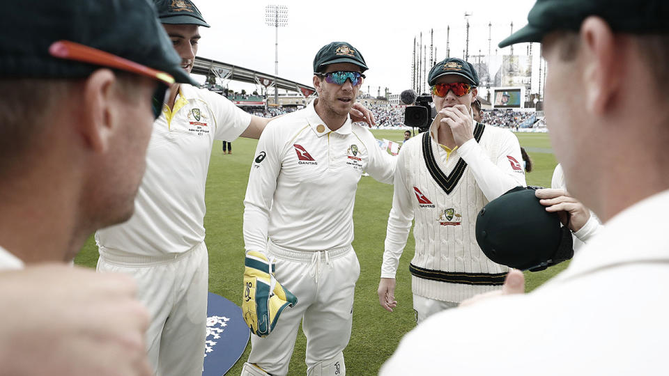 Tim Paine, pictured here with his teammates during the fifth Test.