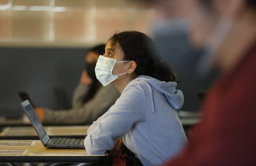 HAWTHORNE, CA - JULY 26: Eliza Lopez is masked in the Spanish class of teacher Leyla Fikes, as students attend the last two day's of summer school at Hawthorne High School in the South Bays Centinela Valley Union High School District which didn't reopen in the spring, and instead reopened for in-person summer instruction. The students are finishing 5 weeks of the summer school session. Various summer schools are in session, and some districts see them as a trial run for the fall when it comes to protocols like distancing and masking mandates. Hawthorne High School on Monday, July 26, 2021 in Hawthorne, CA. (Al Seib / Los Angeles Times).