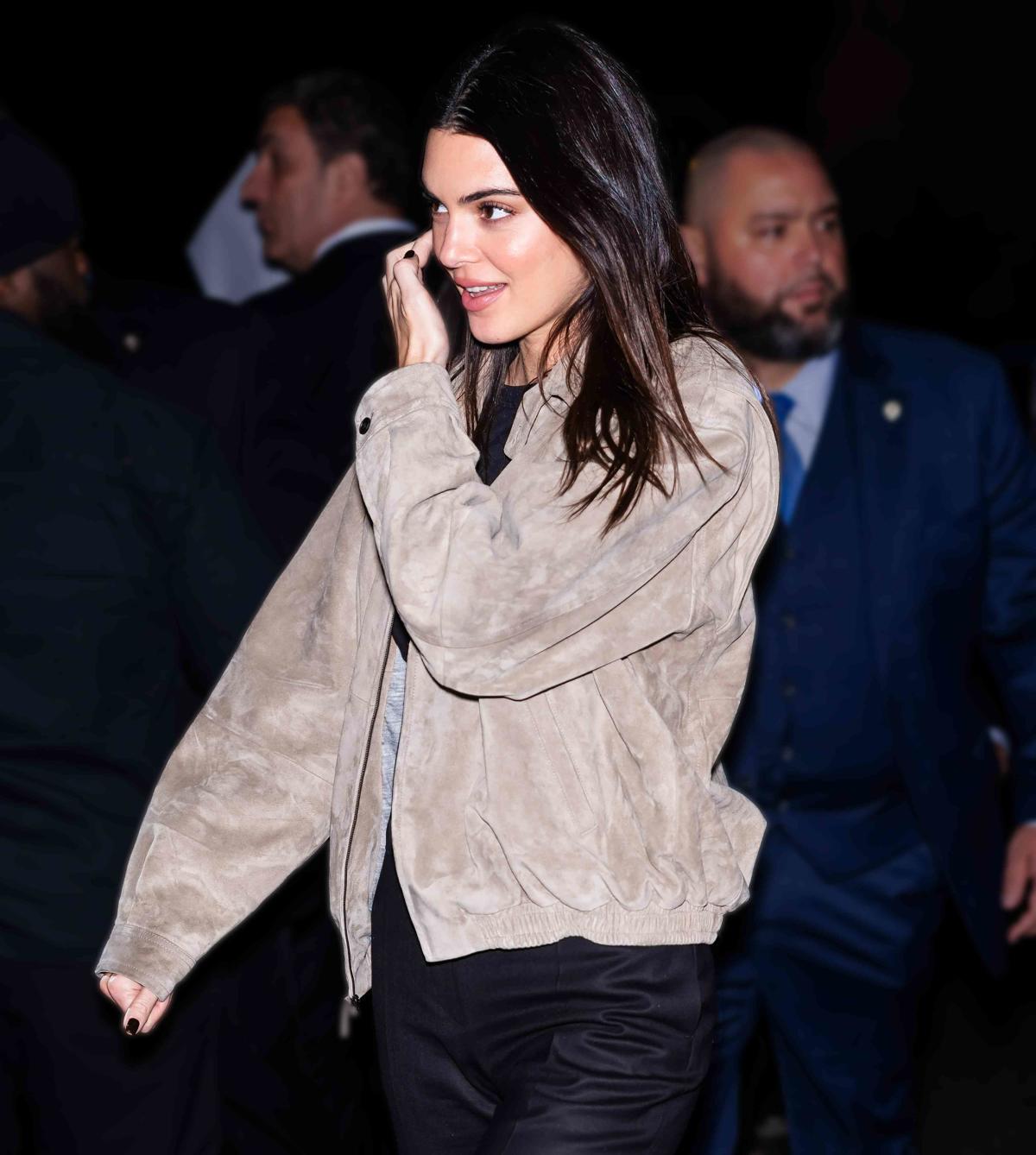 Kendall Jenner cuts a casual figure in an oversized blue jumper as