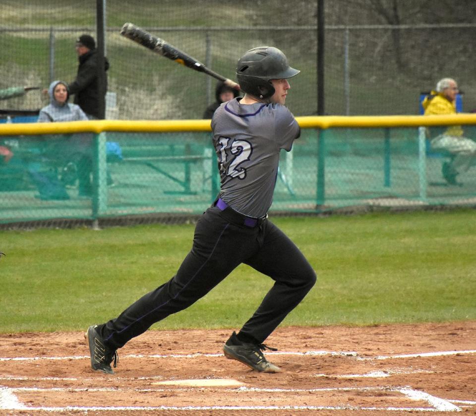 Rikki Smith follows through on his swing and delivers a triple to drive home the first run for Little Falls against Sauquoit Valley. Monday's game was the first this season played under the Veterans Memorial Park lights in Little Falls. The teams play again Tuesday at Sauquoit Valley.