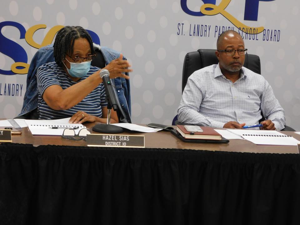 St. Landry Parish School Board member Hazel Sias, left, makes a comment during a Monday night budget hearing. Beside her is St. Landry Parish Schools Superintendent Patrick Jenkins.