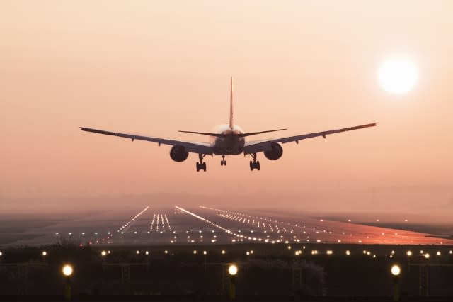 Aircraft landing on runway