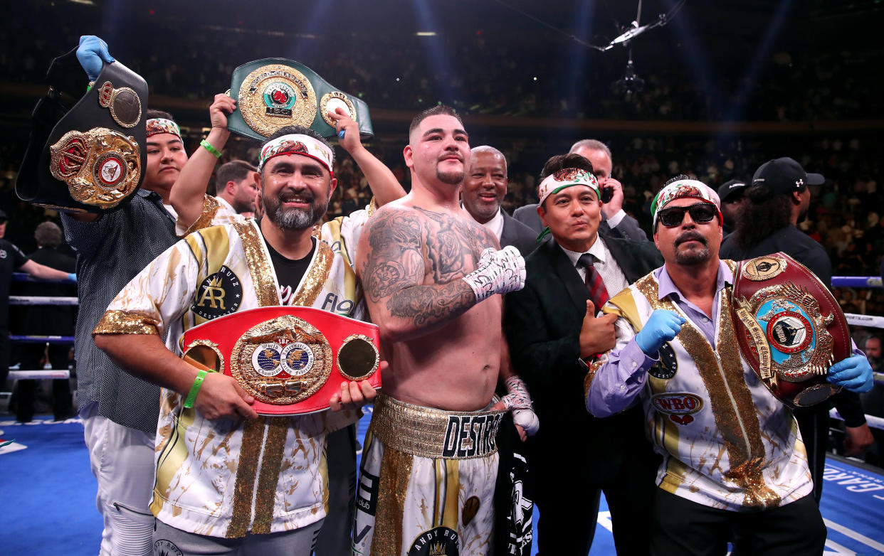 Andy Ruiz Jr (centre) celebrates the win in the WBA, IBF, WBO and IBO Heavyweight World Championships title fight against Anthony Joshua at Madison Square Garden, New York. (Photo by Nick Potts/PA Images via Getty Images)