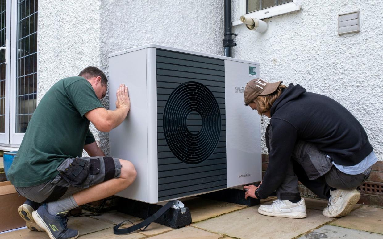 Air source heat pump installers from Solaris Energy installing a Vaillant Arotherm plus 7kw air source heat pump - Andrew Aitchison