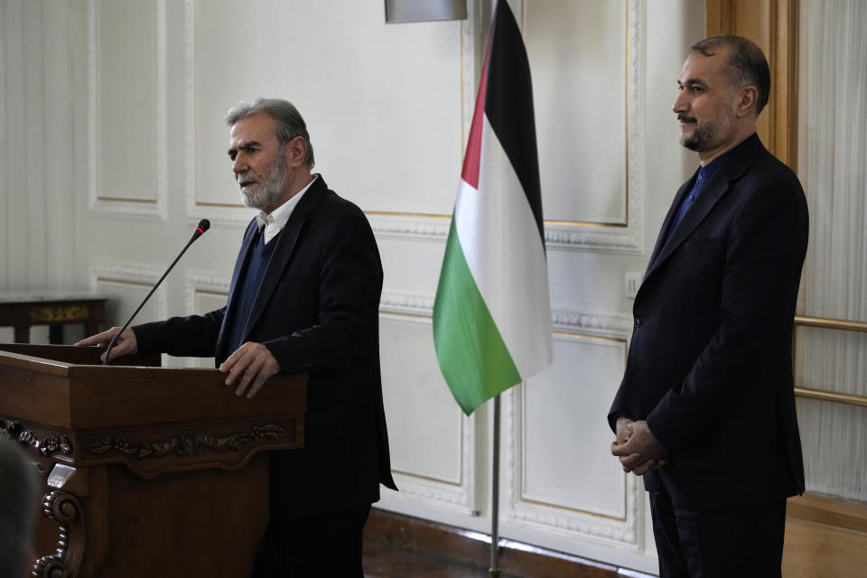 The leader of the Palestinian Islamic Jihad group Ziad Nakhaleh briefs the media after his meeting with the Iranian Foreign Minister Hossein Amirabdollahian, right, in Tehran, Iran, Saturday, March 30, 2024. (AP Photo/Vahid Salemi)