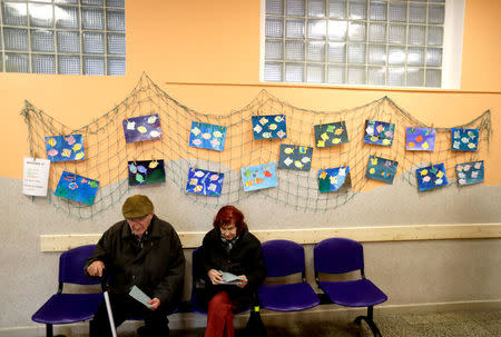 Elderly people wait to cast their votes in parliamentary elections at a polling station in Prague, Czech Republic October 20, 2017. REUTERS/David W Cerny