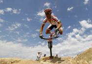 Hungary's Andras Parti reacts as he falls during the men's cross-country mountain bike event at Hadleigh Farm during the London 2012 Olympic Games August 12, 2012. OLY-CYCL-CMMBIK/(CMM021101) REUTERS/Stefano Rellandini (BRITAIN - Tags: OLYMPICS SPORT CYCLING TPX IMAGES OF THE DAY) 