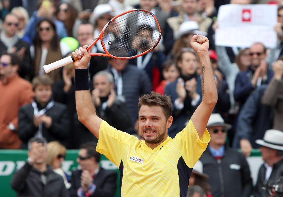 Stanislas Wawrinka of Switzerland celebrates after defeating David Ferrer of Spain, during their semifinal match of the Monte Carlo Tennis Masters tournament in Monaco, Saturday, April, 19, 2014. Wavrinka won 6-1, 7-6. (AP Photo/Claude Paris)