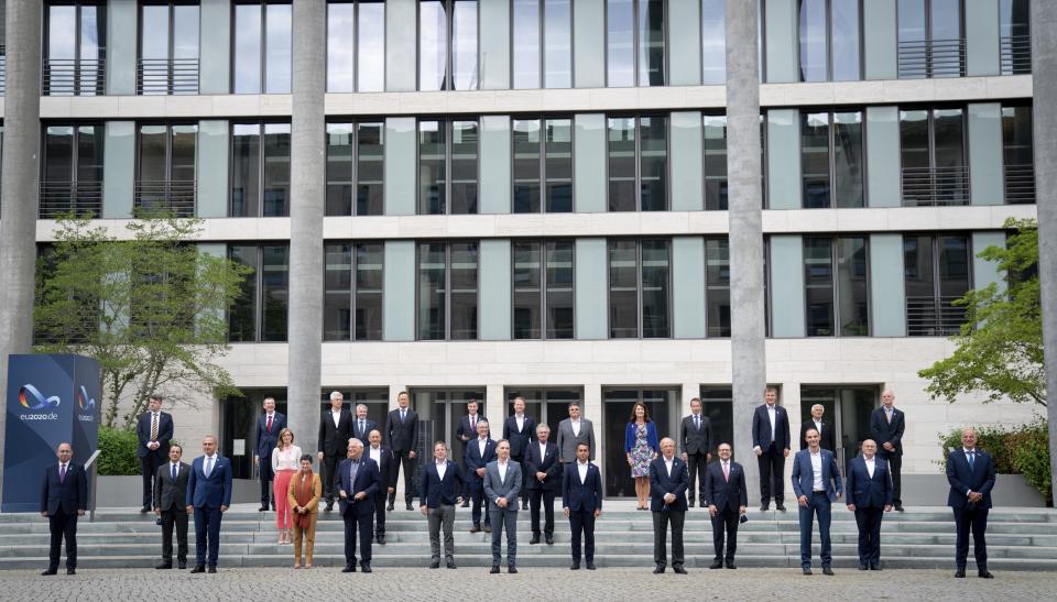 he Foreign Ministers of the European Union, Bogdan Aurescu (Romania, l-r), Urmas Reinsalu (Estonia), Nikos Christodoulides (Cyprus), Gordan Grlic Radman (Croatia), Edgars Rinkevics (Latvia), Ekaterina Zaharieva (Bulgaria), Arancha Gonzales Laya (Spain), Ivan Korcok (Slovakia), Josep Borrell (EU Foreign Affairs Commissioner), Pekka Haavisto (Finland), Jean-Yves Le Drian (France), Peter Szijjarto (Hungary), David McAllister (EU Member of Parliament), Evarist Bartolo (Malta), Heiko Maas (SPD, Germany), Jeppe Kofod (Denmark), Jean Asselborn (Luxembourg), Linas Antanas Linkevicius (Lithuania), Luigi Di Maio (Italy), Ann Linde (Sweden), Augusto Santos Silva (Portugal), Philippe Goffin (Belgium), Alexander Schallenberg (Austria), Tomas Petricek (Czech Republic), Anze Logar (Slovenia), Zbigniew Rau (Poland), Stef Blok (Netherlands), Nikos Dendias (Greece), and a few others have lined up for the family photo on the sidelines of the informal talks of the EU foreign ministers in Berlin, Germany, Friday, Aug. 28, 2020. The topics of the so-called Gymnich meeting include developments in Belarus and the dispute over natural gas in the eastern Mediterranean between Turkey and the EU states of Greece and Cyprus. (Kay Nietfeld/dpa via AP)