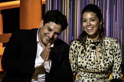 The Argentine-born chef-owner of Mirazur, Mauro Colagreco (L) and his wife Julia show their gratitude after winning the top restaurant award