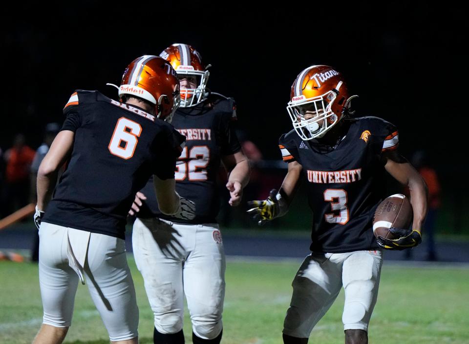 University's Jermane Hayes (3) celebrates scoring a touchdown during a game with Spruce Creek at University High School in Orange City, Friday, Oct. 13, 2023.