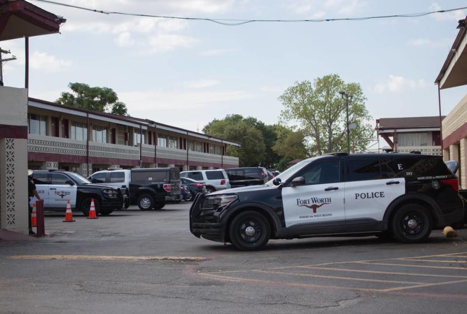 Fort Worth police were on scene investigating Tuesday in a room at the Mid City Inn, an extended-stay motel in the 1400 block of West Euless Boulevard in Euless, where the suspect in a triple homicide had been staying.