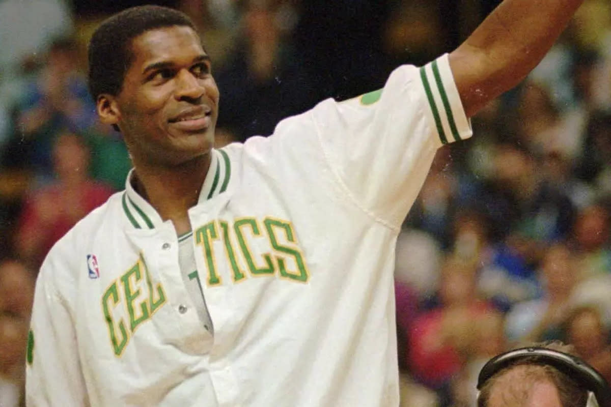 A three-time NBA champion with the Celtics, Robert Parish thinks Brad Stevens is a “solid coach.” (AP)