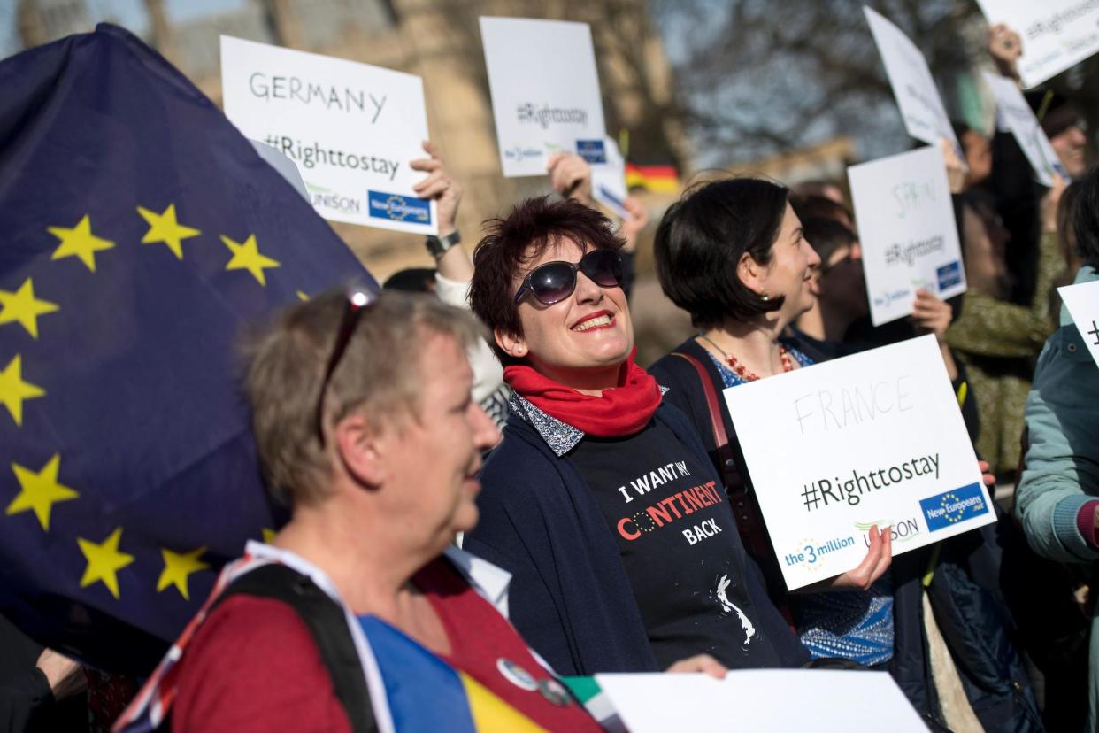 European workers including nurses, social workers and teaching assistants staging a demo outside the Houses of Parliament in February: AFP/Getty Images