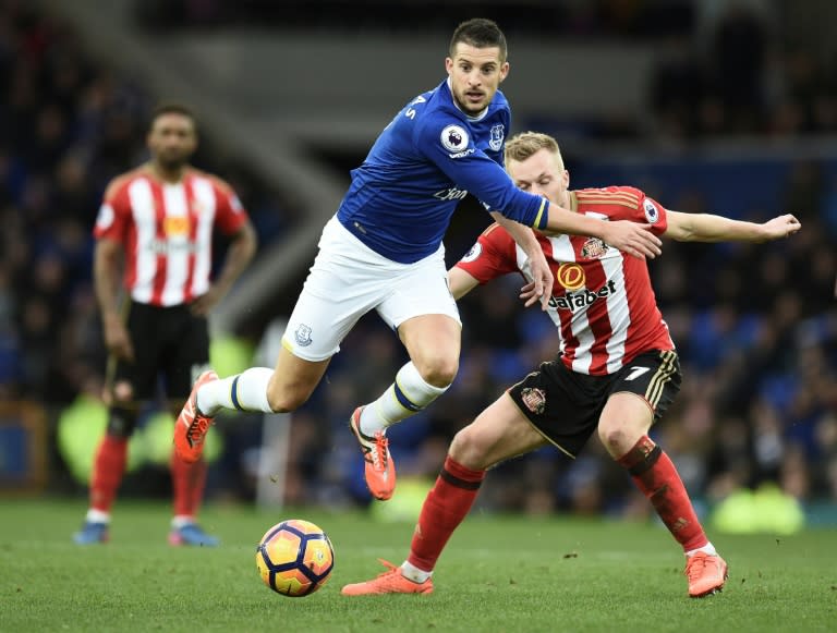 Everton's striker Kevin Mirallas (L) vies with Sunderland's midfielder Sebastian Larsson (R) during the English Premier League football match February 25, 2017