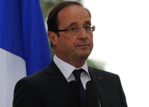 President Francois Hollande has defended France's imminent exit from Afghanistan, saying 2,000 combat troops will leave in a coordinated withdrawal this year but vowing not to abandon the country