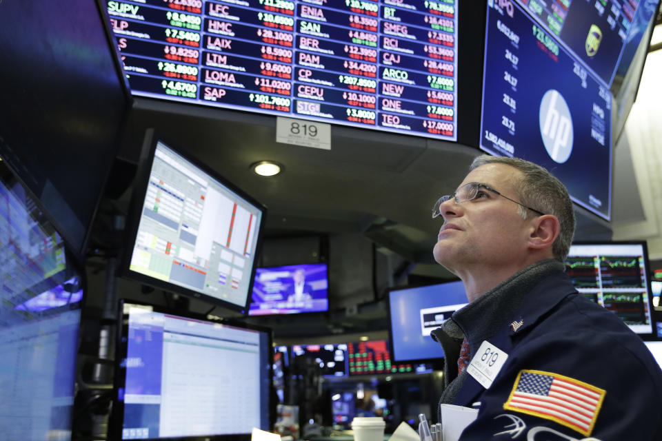 Trader Anthony Rinaldi follows stock activity, Monday, Nov. 19, 2018, at the New York Stock Exchange. Big technology and internet companies came under heavy selling pressure again on Monday, leading to broad losses across the stock market. The Dow Jones Industrial Average briefly fell 500 points. (AP Photo/Mark Lennihan)