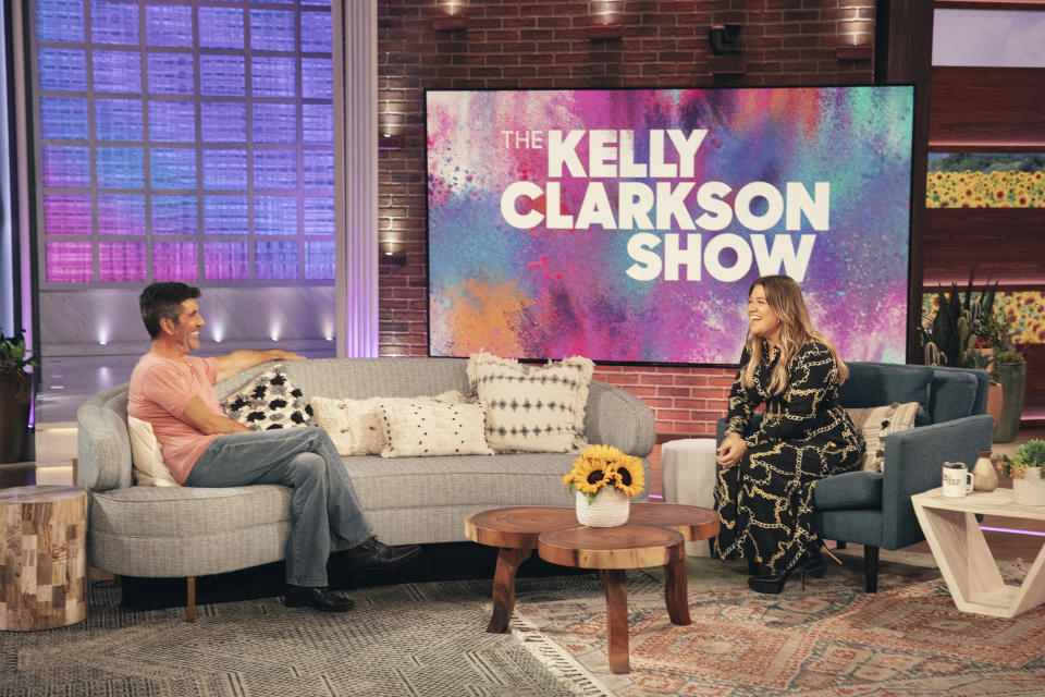 THE KELLY CLARKSON SHOW -- Episode 4174 -- Pictured: (l-r) Simon Cowell, Kelly Clarkson -- (Photo by: Weiss Eubanks/NBCUniversal/NBCU Photo Bank via Getty Images)