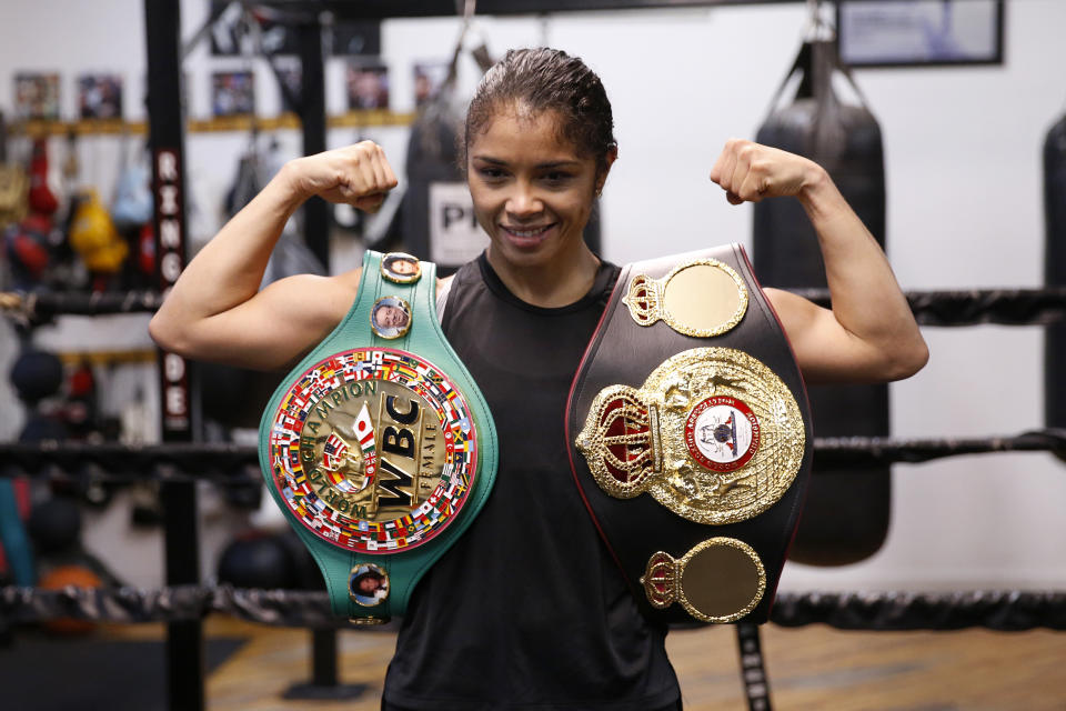 CHICAGO, ILLINOIS - SEPTEMBER 27: Jessica McCaskill poses with the WBA and WBC belts during a media workout at Body Shot Boxing Club on September 27, 2019 in Chicago, Illinois. (Photo by Justin Casterline/Getty Images)