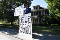 Protesters rally outside the house of Senate Majority Leader Mitch McConnell, R-Ky., in Louisville, Ky., Saturday, Sept. 19, 2020. McConnell vowed on Friday night, hours after the death of Supreme Court Justice Ruth Bader Ginsburg to call a vote for whomever President Donald Trump nominated as her replacement. (AP Photo/Timothy D. Easley)