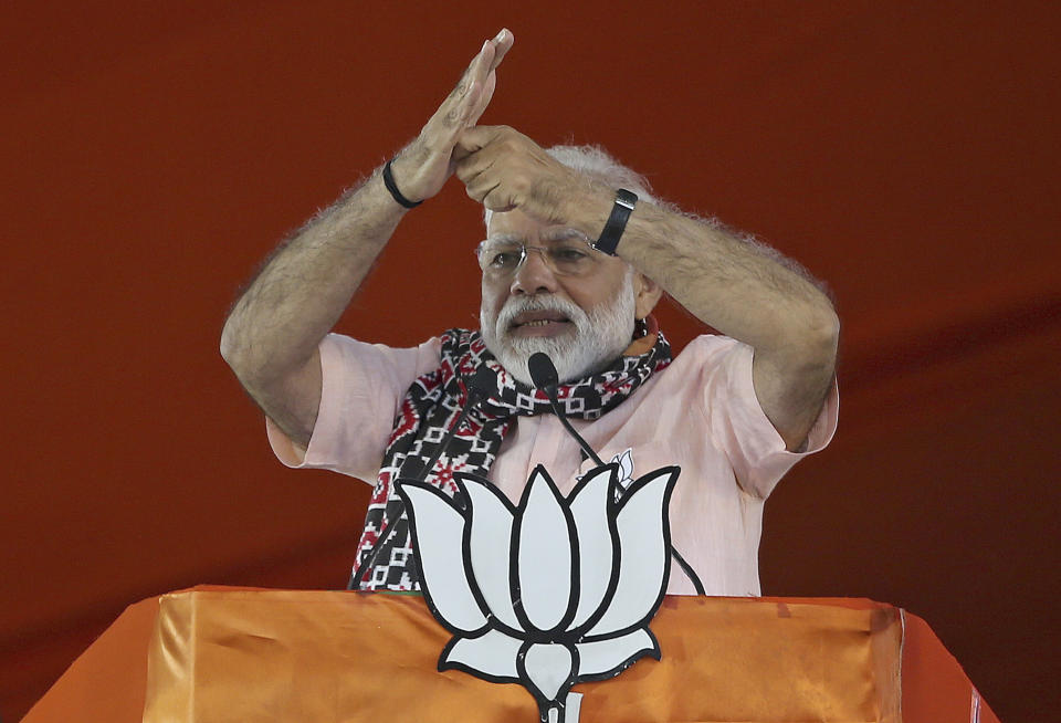 FILE - In this April 1, 2019, file photo, Indian Prime Minister Narendra Modi gestures as he speaks during an election campaign rally of his Bharatiya Janata Party (BJP) in Hyderabad, India. In the world’s largest democracy, few issues reach as broad a consensus as Kashmir, that the Muslim-majority region must remain part of Hindu-majority India. Modi is using this, and a February attack on Indian paramilitary forces in Kashmir, to consolidate the Hindu vote in India’s five-week elections that conclude May 21 to bolster his campaign-slogan claim to be India’s chowkidar, or watchman. (AP Photo/Mahesh Kumar A., File)