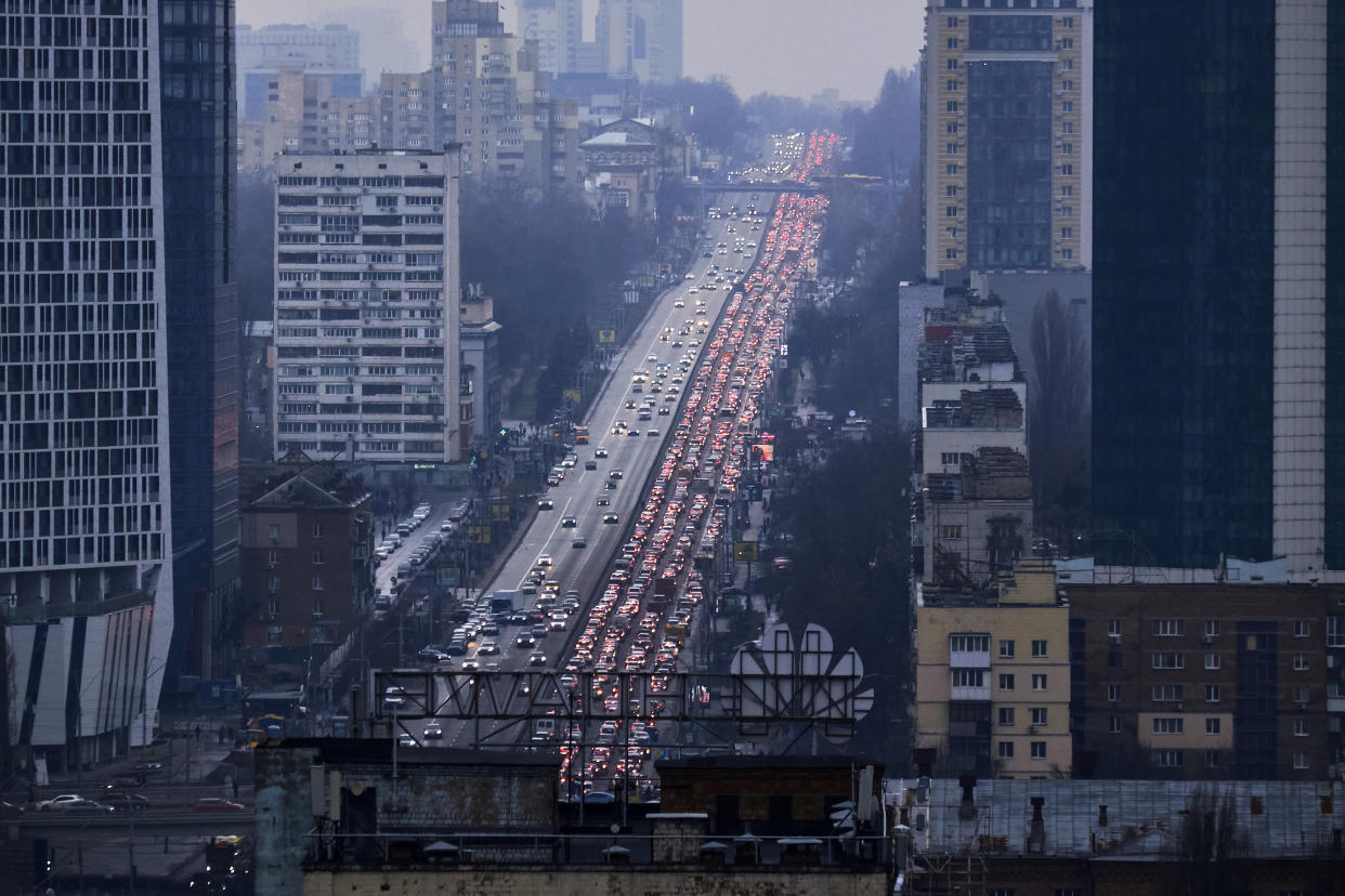 KYIV, UKRAINE - FEBRUARY 24: Inhabitants of Kyiv leave the city following pre-offensive missile strikes of the Russian armed forces and Belarus on February 24, 2022 in Kyiv, Ukraine. Overnight, Russia began a large-scale attack on Ukraine, with explosions reported in multiple cities and far outside the restive eastern regions held by Russian-backed rebels. (Photo by Pierre Crom/Getty Images)