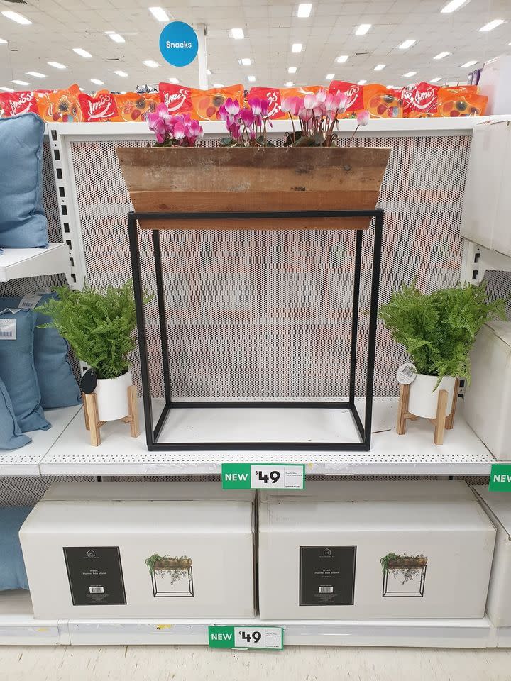 Big W's 'cute' wooden plant stand is thrilling green thumbs. Photo: Instagram/addicted_to_bargains.