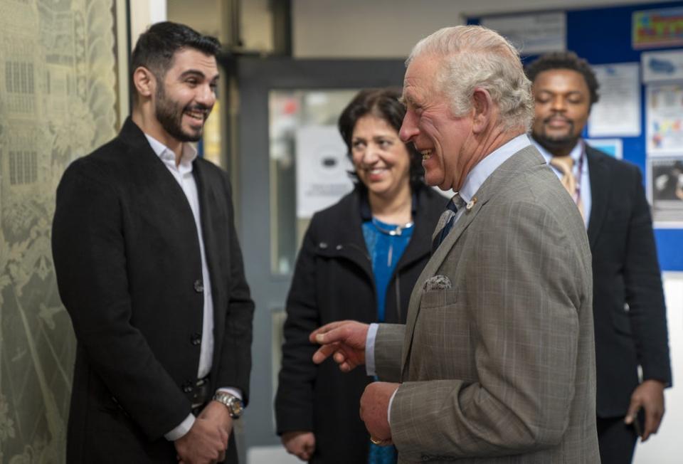 The Prince of Wales Syrian refugee Osama Khaklid Sharkia (Arthur Edwards/The Sun/PA) (PA Wire)