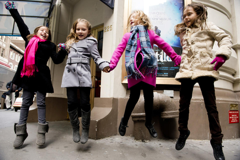 Actresses from left, Bailey Ryon, Sophia Gennusa, Milly Shapiro and Oona Laurence, who will share the title role in "Matilda the Musical" on Broadway, pose for a portrait outside the Shubert Theatre, on Thursday, Nov. 15, 2012 in New York. (Photo by Charles Sykes/Invision/AP)