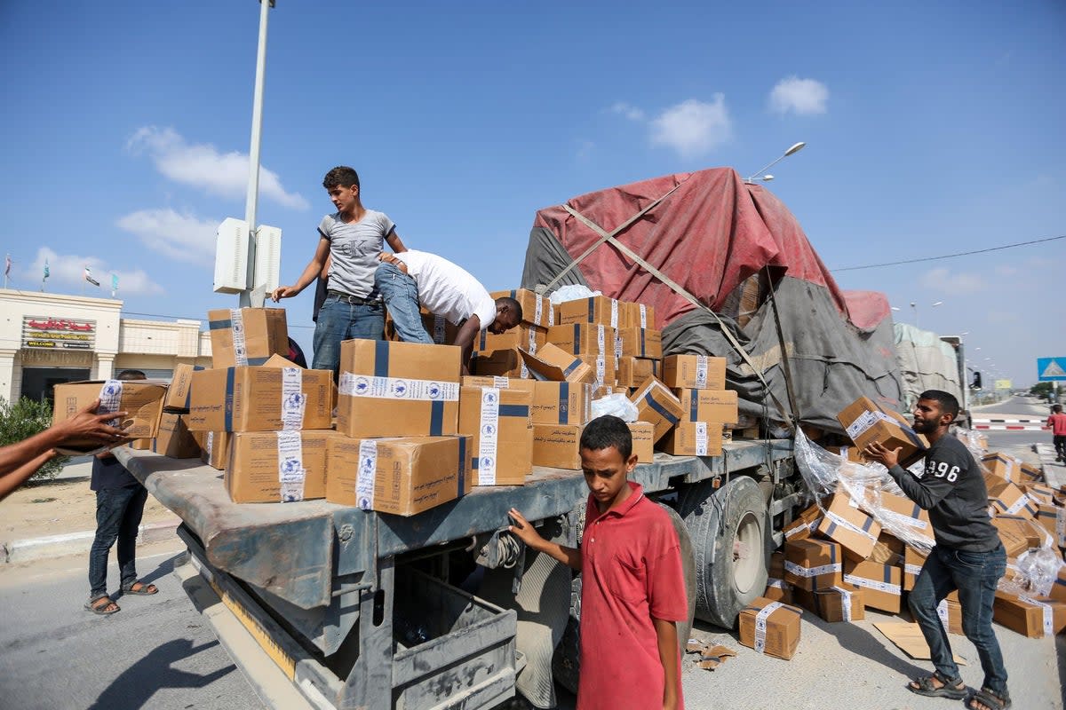 Trucks carrying aid enter through the Rafah crossing on November 2 (Getty Images)