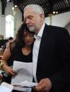 <p>Labor leader Jeremy Corbyn comforts a local resident at St Clement’s Church in west London where volunteers have provided shelter and support for people affected by the fire at Grenfell Tower on June 15, 2017 in West London, England. (Photo: David Mirzoeff – WPA Pool/Getty Images) </p>