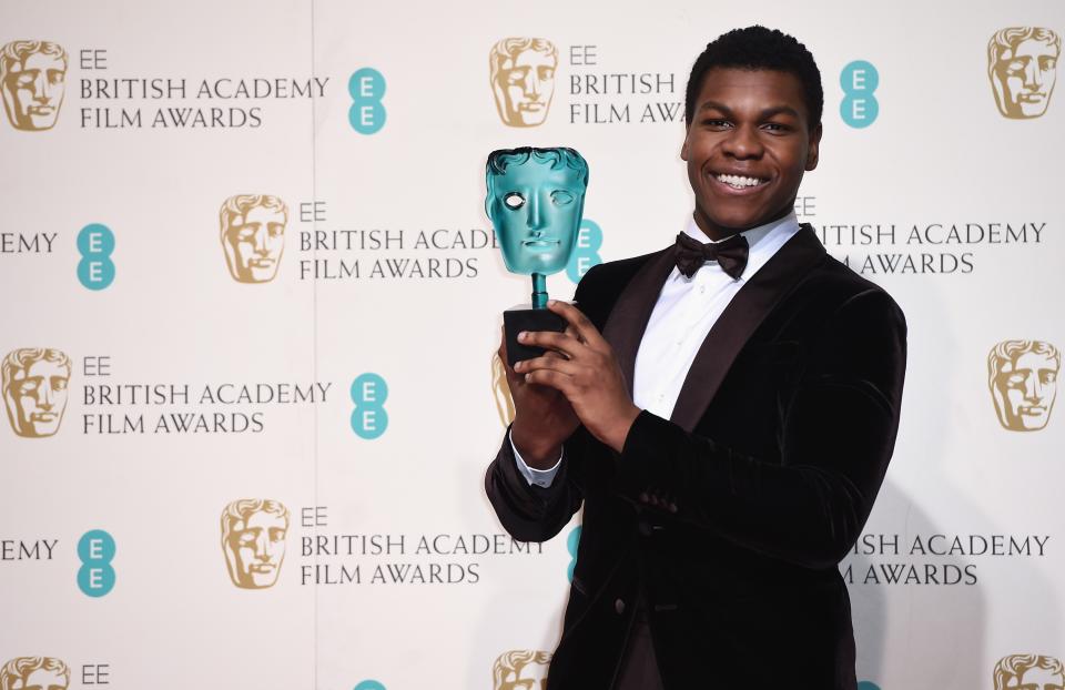 LONDON, ENGLAND – FEBRUARY 14: John Boyega poses with the EE Rising Star Award in the winners room at the EE British Academy Film Awards at the Royal Opera House on February 14, 2016 in London, England. (Photo by Ian Gavan/Getty Images)