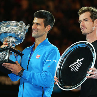 Djokovic and Murray receive their trophies as winner and runner-up.